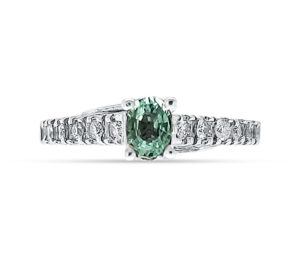 PARAIBA TOURMALINE AND DIAMOND RING
ENGAGEMENT STYLE
.35 CT PARAIBA
.25 CTTW VS DIAMONDS
18KW  SIZE 6.5