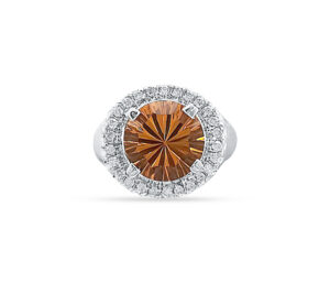 MADEIRA CITRINE AND DIAMOND RING
2.90 CT PORTUGUESE ROUND CITRINE
.30 CTTW SI DIAMONDS
14KW  SIZE 8.5