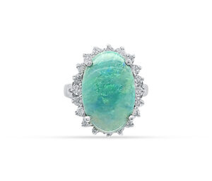 AUSTRALIAN BLACK OPAL AND DIAMOND RING
6.81 CT OPAL
.95 CTTW SI DIAMONDS
14KW  SIZE 7.5
