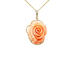 HAND CARVED CORAL ROSE 
12.5GM 
14KY 
1.25" APPROX LENGTH 
1" APPOX WIDTH 
*CHAIN NOT INCLUDED
