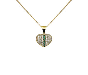 DIAMOND AND EMERALD PENDANT 
1.06CT VS DIAMONDS 
.22CT EMERALD 
18KY 
.75" APPROX LENGTH 
*CHAIN NOT INCLUDED