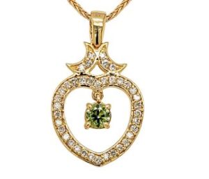 RUSSIAN DEMANTOID AND DIAMOND PENDANT 
.45CT DEMANTOID GARNET 
.40CTTW VS DIAMOND 
18KY 
HEART PENDANT 
1" APPROX LENGTH 
CHAIN NOT INCLUDED