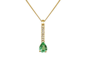 PARAIBA AND DIAMOND PENDANT 
.95CT COPPER BEARING TOURMALINE 
.14CTTW DIAMONDS SI 
14KY 
1" APPROX LENGTH 
*CHAIN NOT INCLUDED