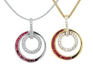 RUBY AND DIAMOND PENDANT 
.70 CTTW RUBY 
.20 CTTW VS DIAMONDS 
.75" APPROX LENGTH 
*CHAIN NOT INCLUDED