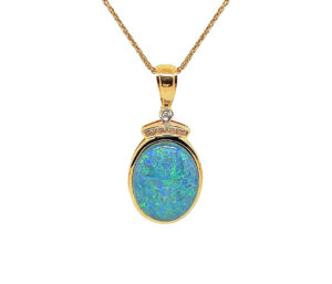 OPAL AND DIAMOND PENDANT 
9.93CT OPAL 
.08 CTTW DIAMOND 
14KY 1.5 APPROX LENGTH