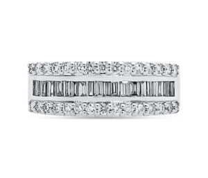 .87 CTTW ROUND & BAGUETTE DIAMONDS
18KT WHITE GOLD
.50 cttw BAGUETTES
.37 cttw ROUNDS
SIZE 8.5
VS1-2 CLARITY
Center row Baugette Diamonds with rounds on top and below
