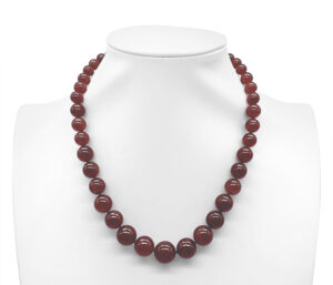 JADE NECKLACE 
6-19MM GRADUATED RED JADE 
18" APPROX LENGTH 
14KY CLASP