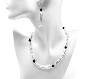 PEARL AND AMETHYST NECKLACE AND EARRING SET 
WHITE BIWA PEARL WHITE ROUND PEARL AND AMETHYST 
SS RHODIUM PLATED TOGGLE CLASP 
15" APPROX LENGTH NECKLACE 
LEVER BACK DANGLE EARRINGS