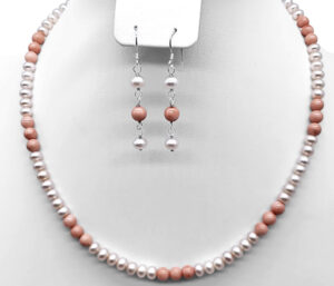 PINK PEARL AND PINK CORAL NECKLACE AND EARRING SET 
5.5-6MM PINK PEARL 
5.5 MM ROUND PINK CORAL
SS RHODIUM PLATED CLASP 
18" WITH 2" EXTENDER LENGTH 
EARRINGS ARE SHEPHERDS HOOK DANGLE