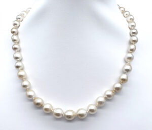 GOLDEN SOUTH SEA PEARL NECKLACE 
7.1-10MM GOLDEN SOUTH SEA PEARL 
14KY BALL CLASP 
18" APPROX LENGTH