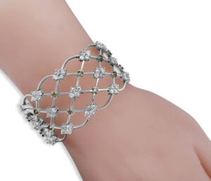 RUSSIAN DEMANTOID AND DIAMOND BRACELET 
14KY 
6.50CT SI DIAMONDS
1.60CT  RUSSIAN DEMANTOID 
7" APPROX LENGTH 
1.25" WIDE
SLIDE AND LOCK CLASP