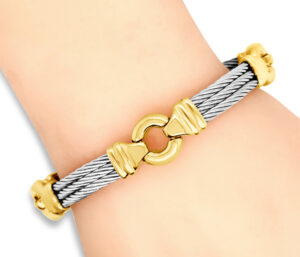 18KT GOLD AND STEEL DESIGNER BRACELET